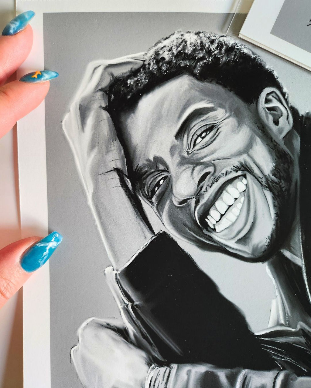 Close-up detail of Chadwick Boseman portrait print by Full Art Alchemist — pencil texture and shading visible