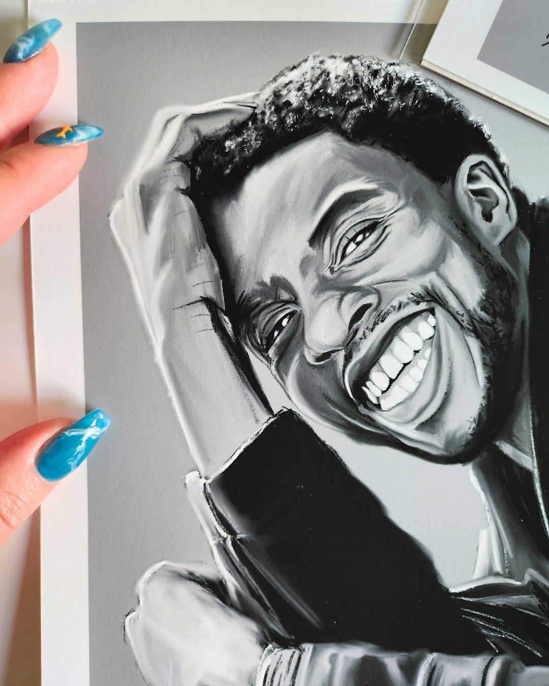 Close-up detail of Chadwick Boseman portrait print by Full Art Alchemist — pencil texture and shading visible