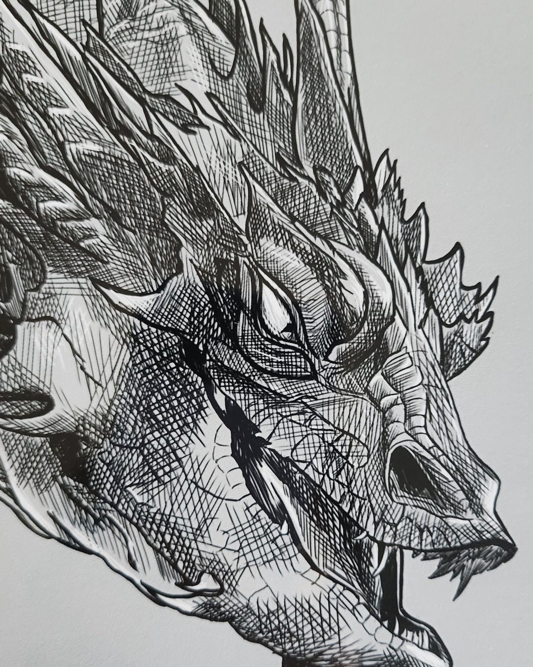 Detail of pencil-drawn dragon head from fantasy art print by Full Art Alchemist — visible texture and linework