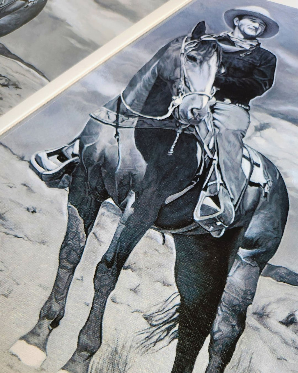 Close-up of horseback cowboy print by Full Art Alchemist — brush texture and canvas detail visible