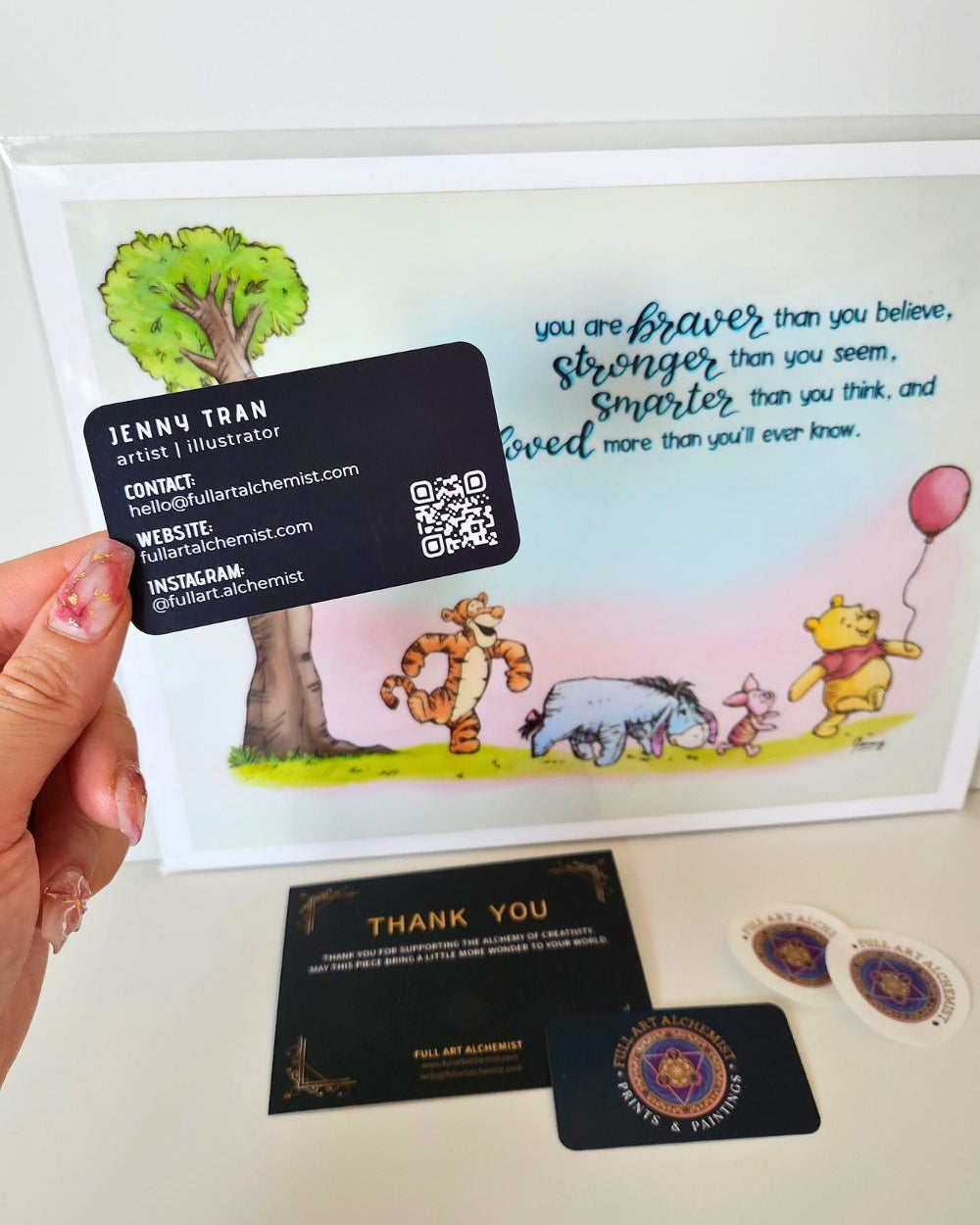 Full Art Alchemist packaging set featuring a Winnie the Pooh fine art print, artist business card, thank-you note, and branded logo stickers. Ideal for gift-ready presentation.