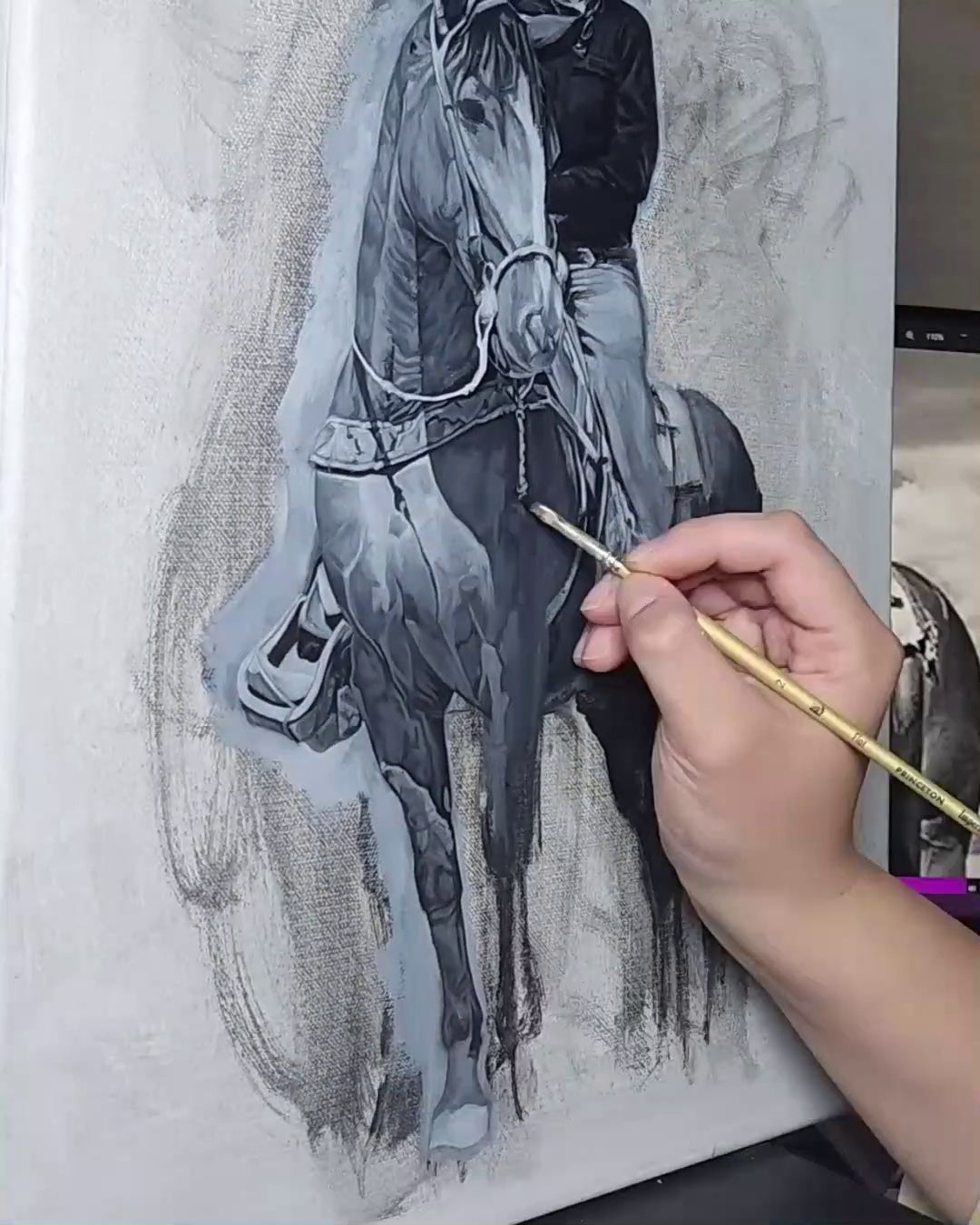 Jenny painting an oil landscape in the middle stage of the process, brush in hand, with the underpainting still partially visible on canvas.