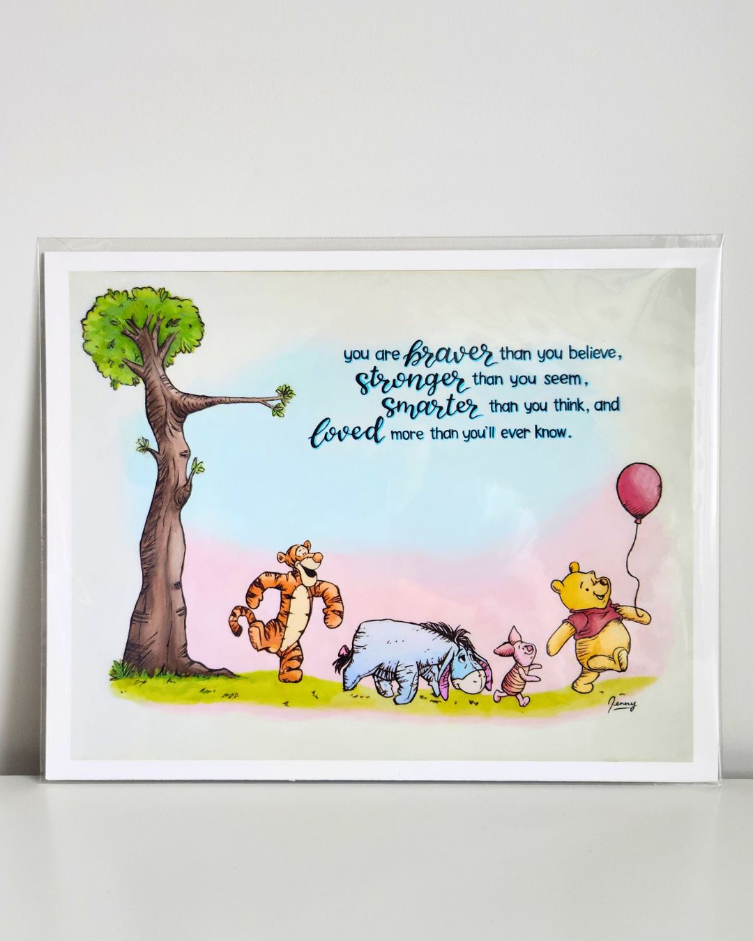 14x11" archival art print of Winnie the Pooh and friends, titled "Core Memory" by Full Art Alchemist, shown front-on in a protective sleeve.
